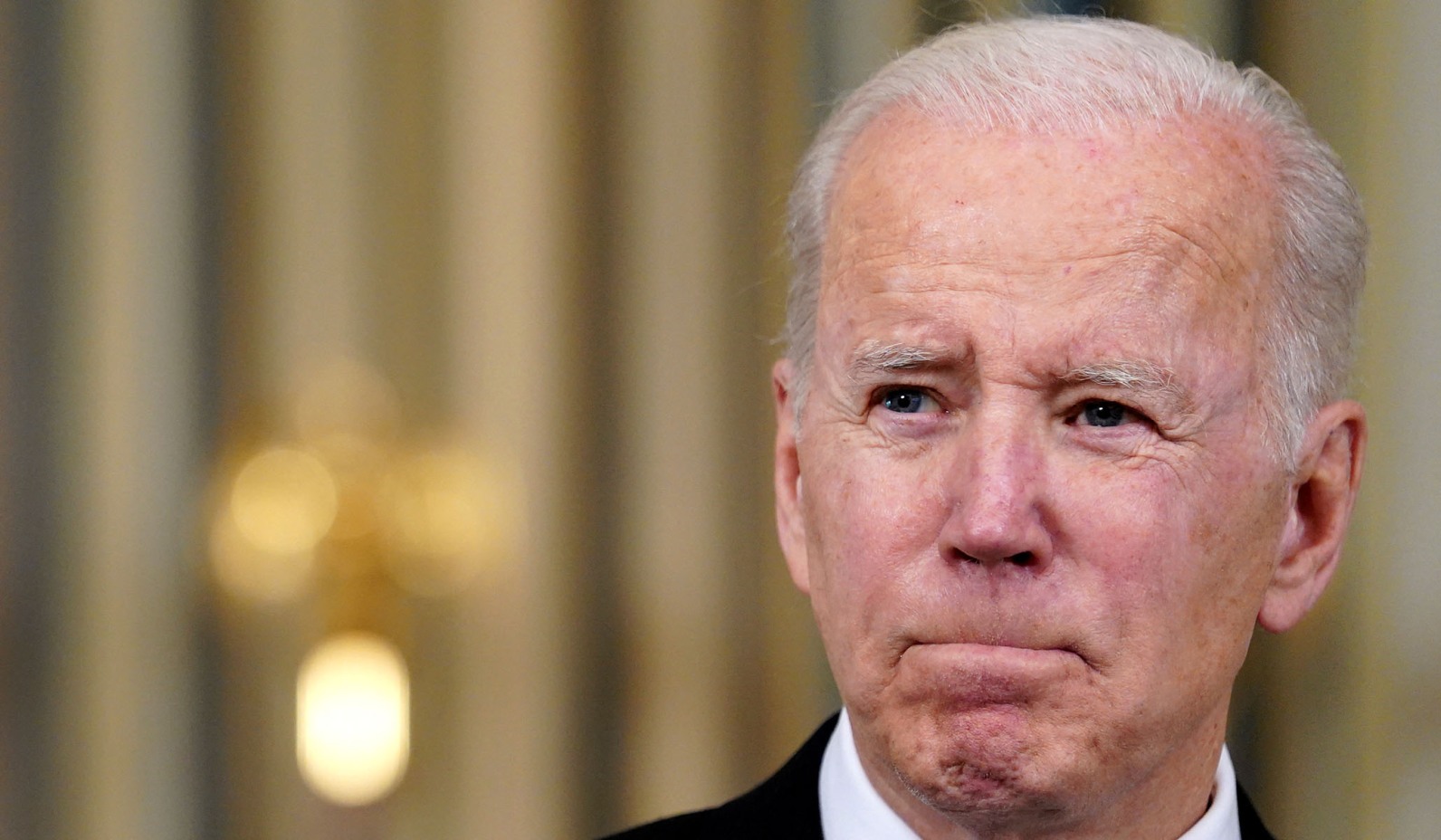 Biden pursed lips