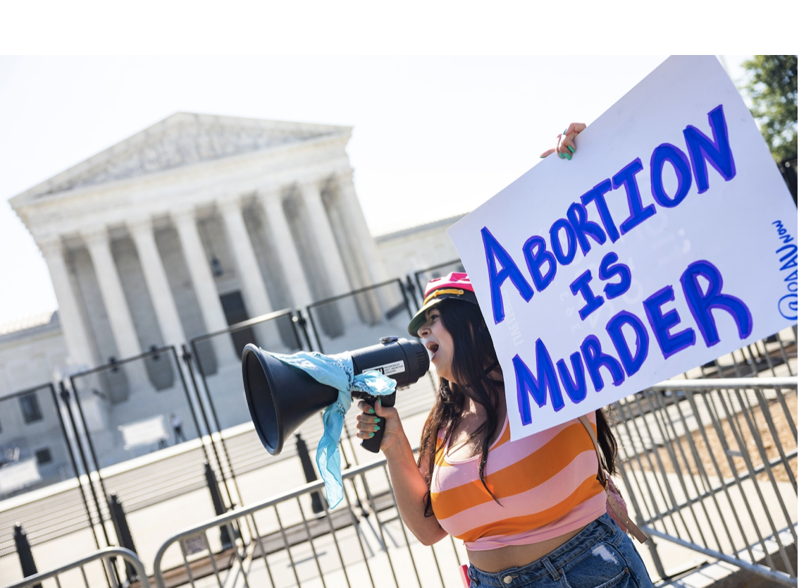 Abortion is murder protester at scotus