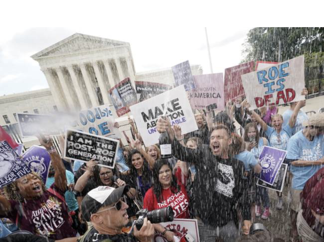 People celebrate overturning roe