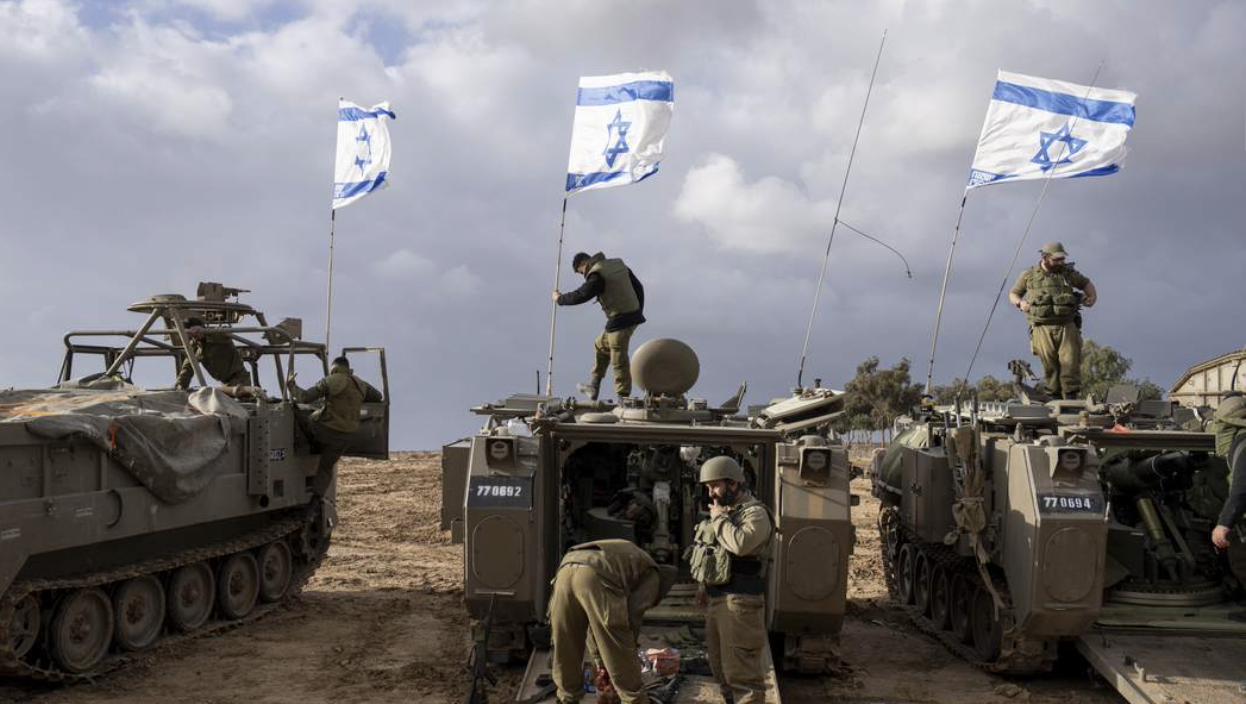 Israeli tanks with israeli flags