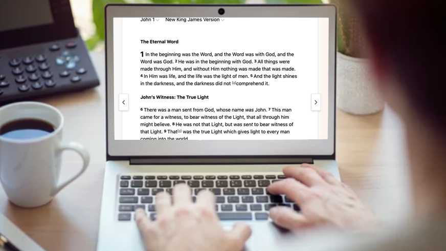 Man reading john 1 on his computer
