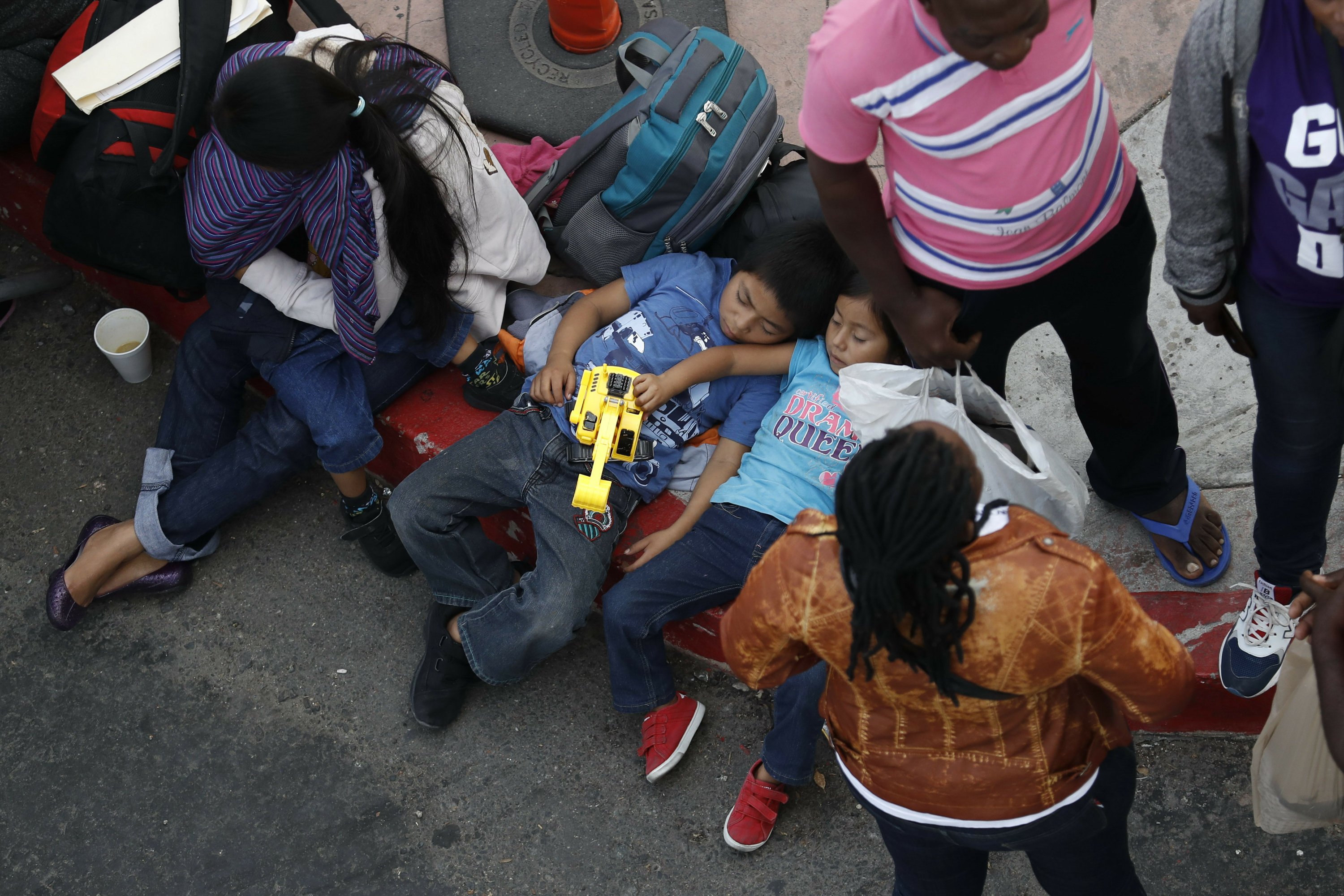 Trump's Asylum Policy Goes Into Effect; Opponents Sue