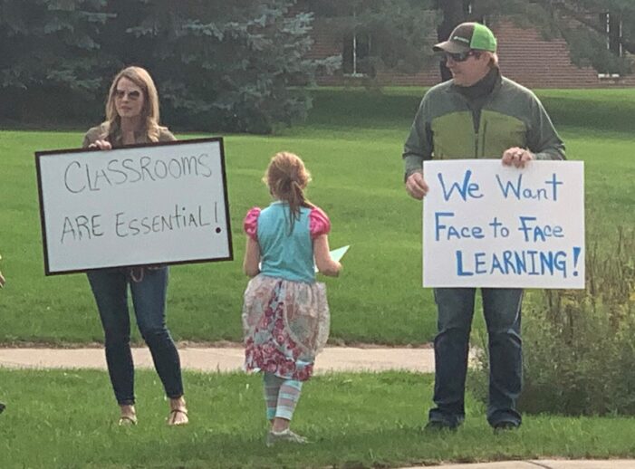 Open school protesters