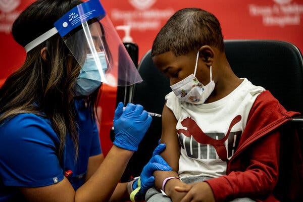 Child getting covid vaccine