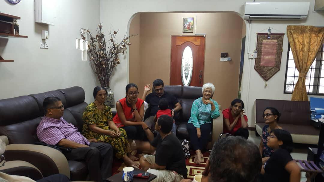 Cardinal having a chat with Antony and Mercy's family.