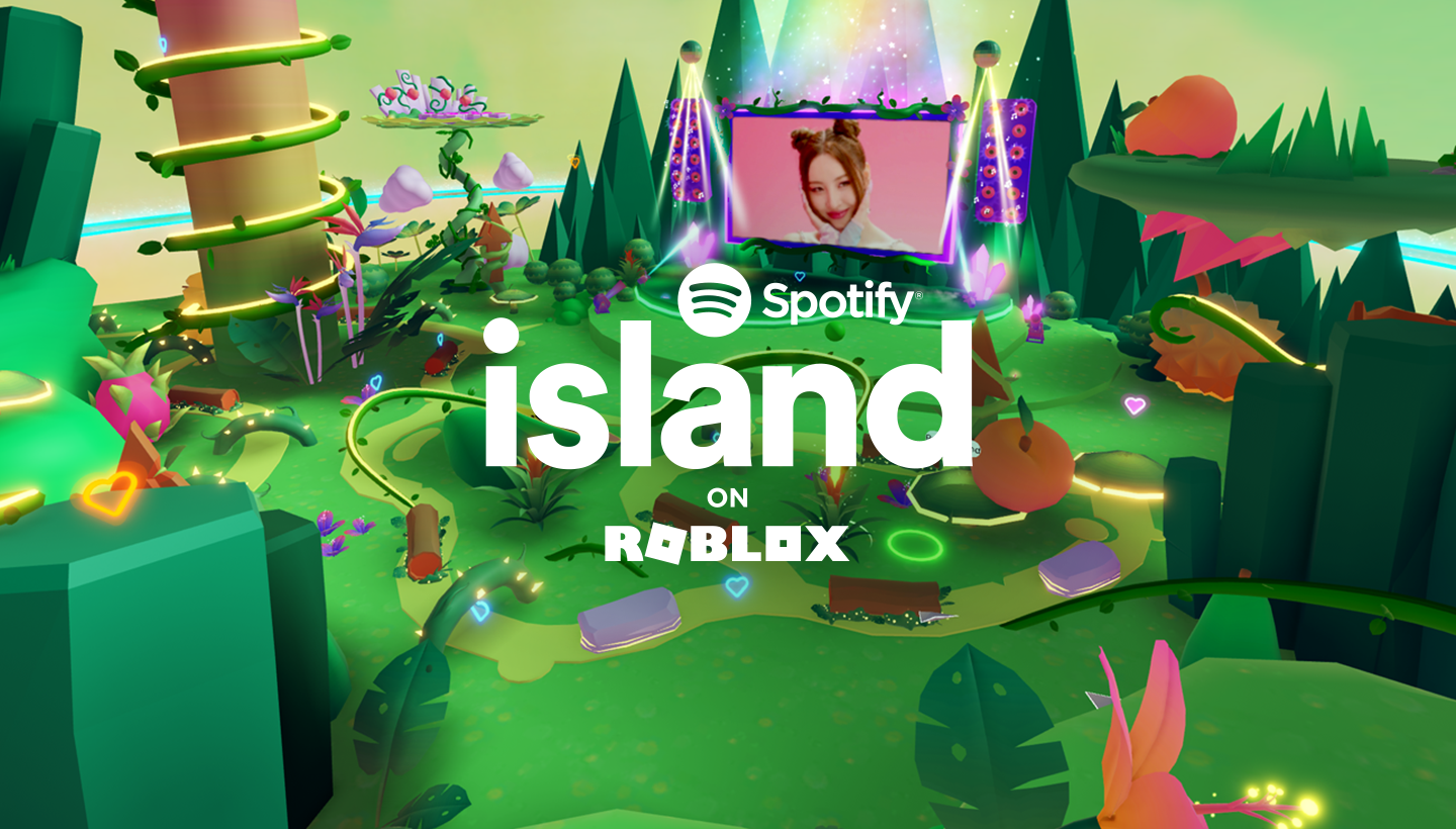 a luscious green land with flowers and plants depicts Spotify Island on Roblox. The singer SUNMI is on a giant screen on the island.