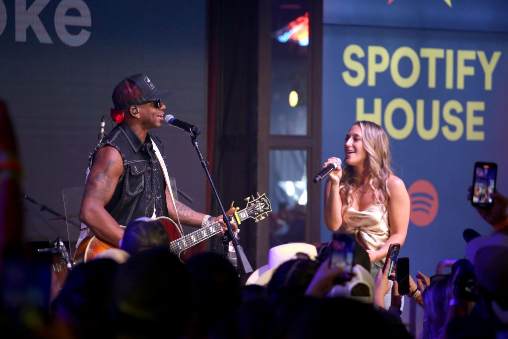 Jimmie Allen and Ashley Cooke perform at Spotify House during CMA Fest at Ole Red