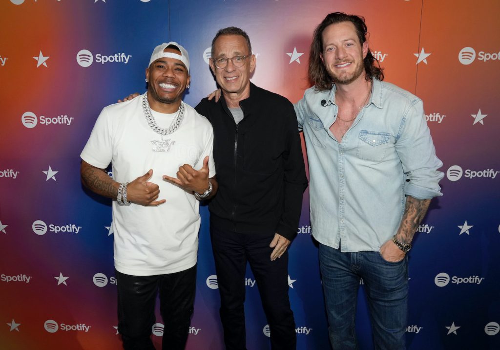 (L-R) Nelly, Tom Hanks and Tyler Hubbard visit Spotify House during CMA Fest at Ole Red