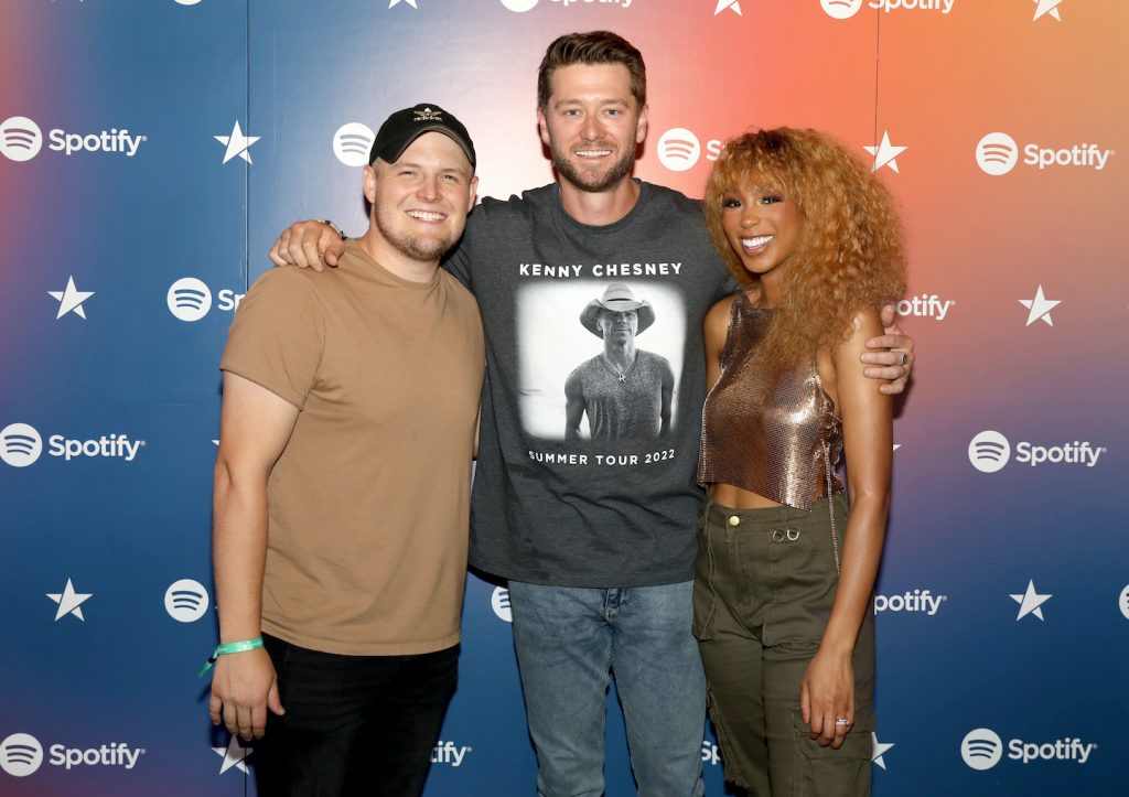 (L-R) Spencer Crandal, Adam Doleac and Tiera Kennedy visit Spotify House during CMA Fest at Ole Red