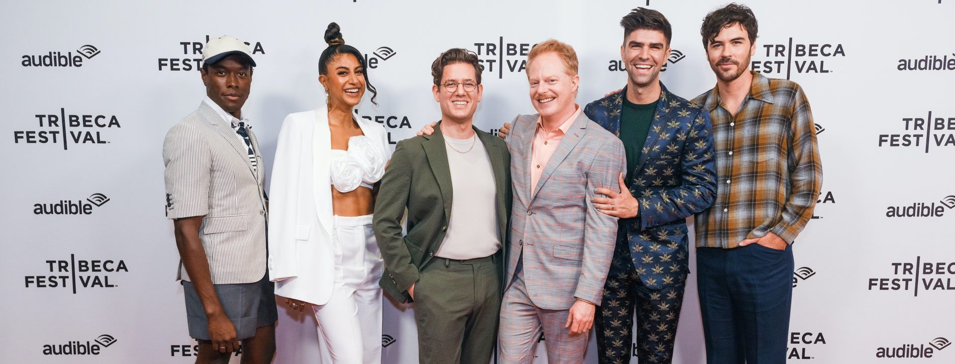 The cast and crew of Gay Pride & Prejudice (L-R Ronald Peet, Vella Lovell, Zackary Grady, Jesse Tyler Ferguson, Justin Mikita, Blake Lee) on the red carpet ahead of their Tribeca Film Festival Panel: “A Romantic Comedy Event: Gay Pride and Prejudice.”