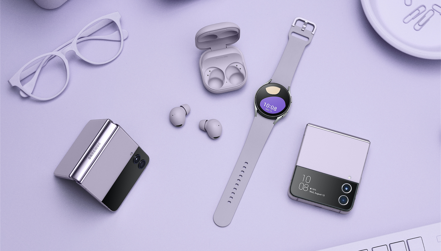 a collection of samsung devices and work acccessories all in the color purplr