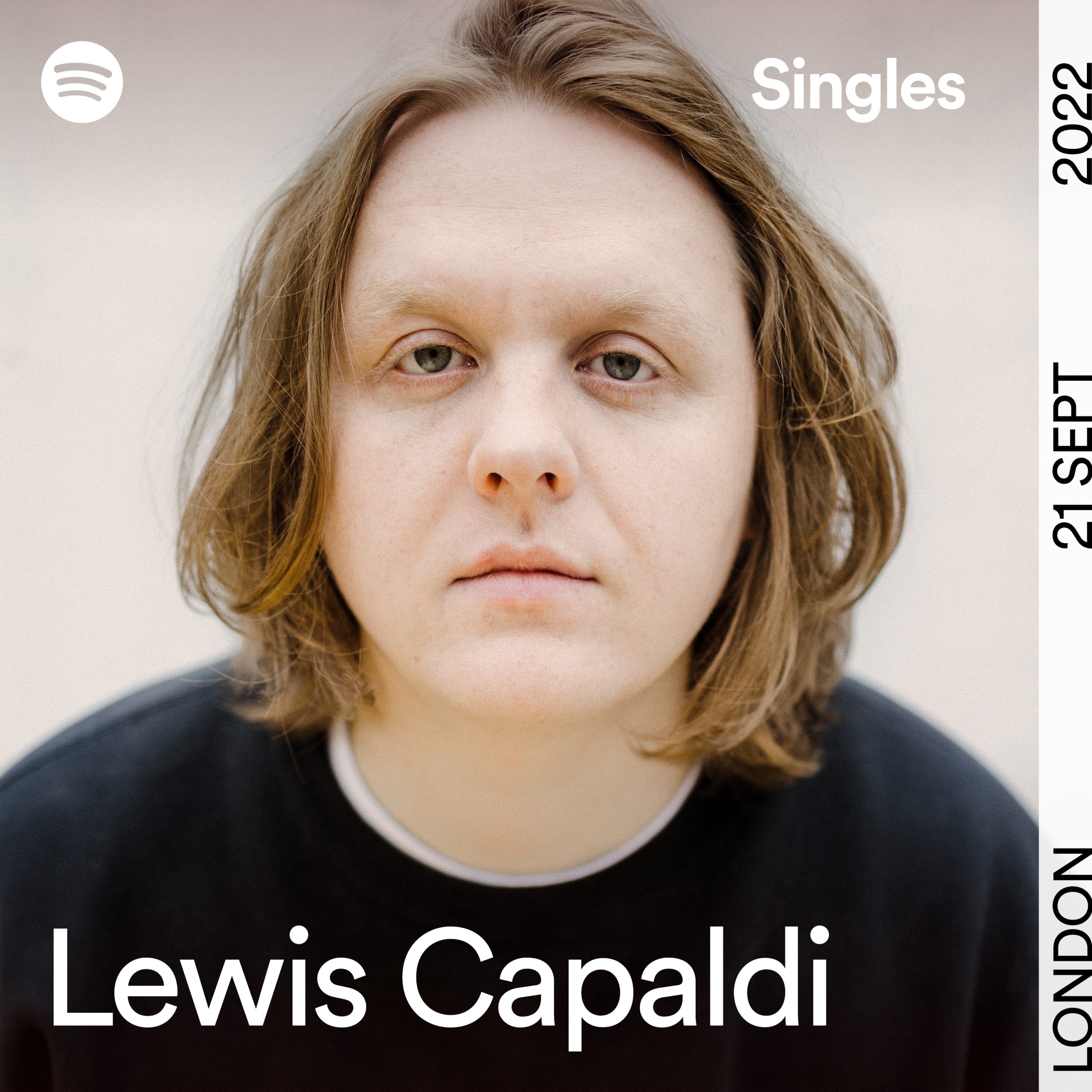 a photograph of lewis capaldi looking at the camera