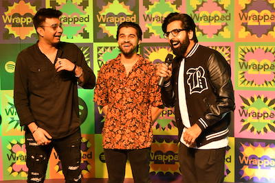 hosts and attendees laugh at the spotify wrapped party in pakistan