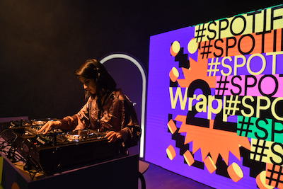 a dj performs on stage at the spotify wrapped party in pakistan