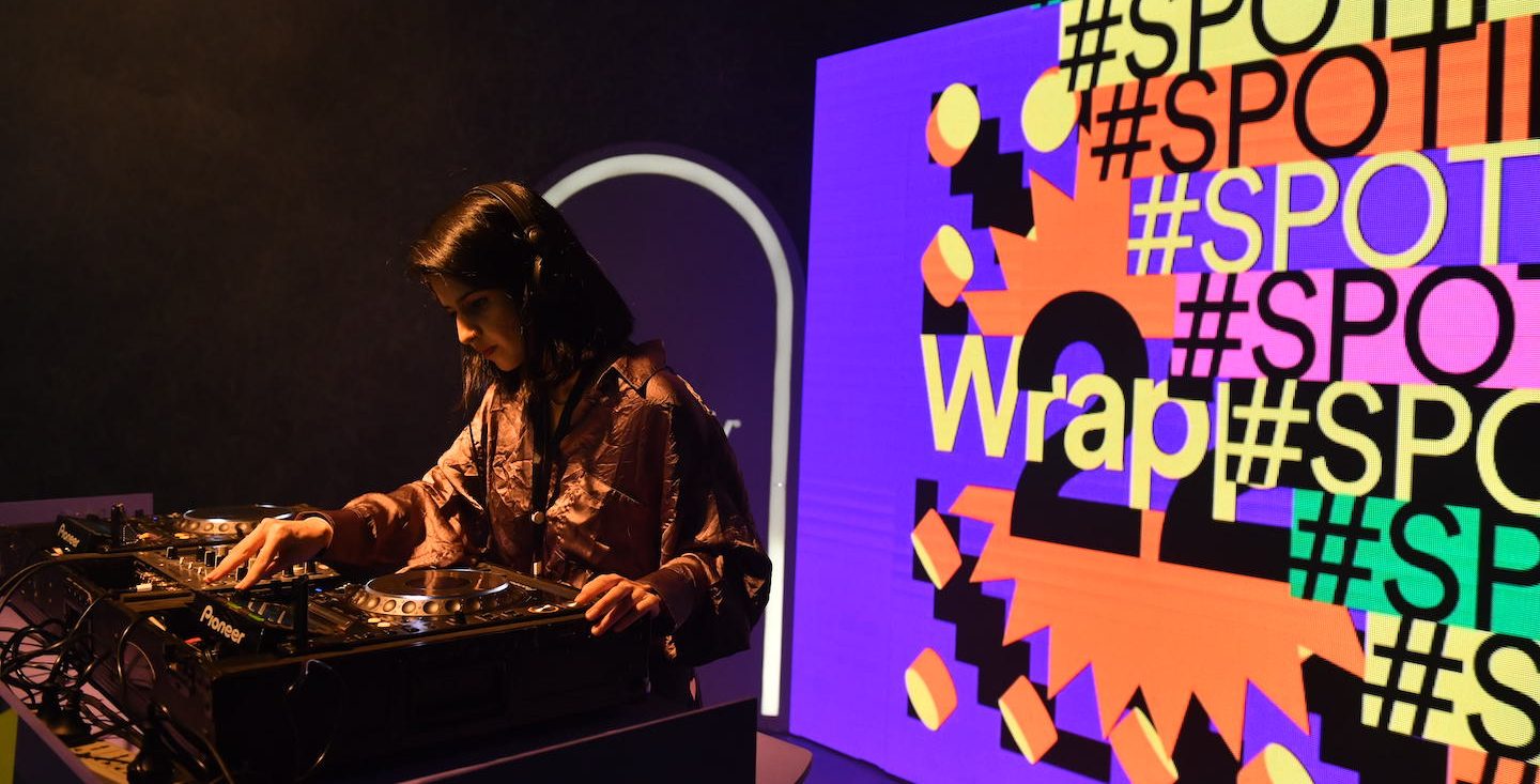 a DJ playing music at a wrapped event in pakistan
