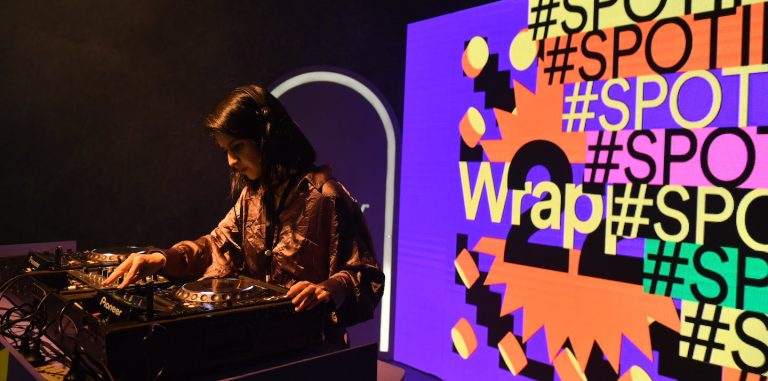 a DJ playing music at a wrapped event in pakistan