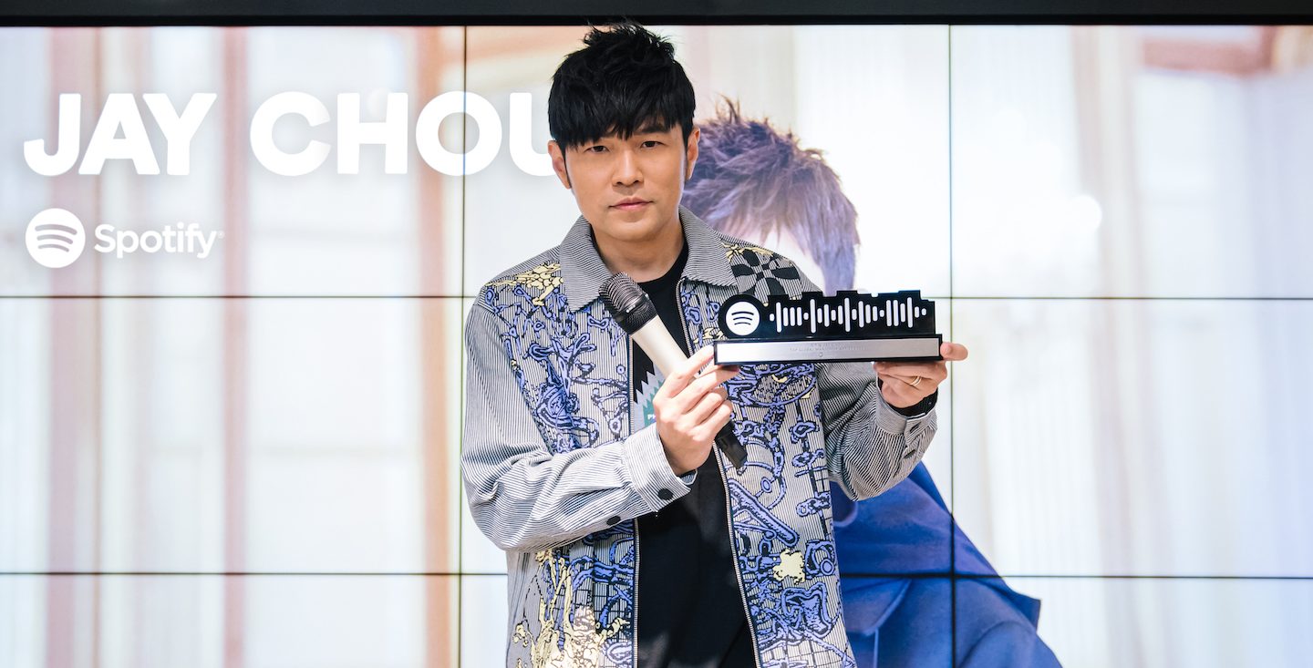 jay chou posing onstage in front of the camera