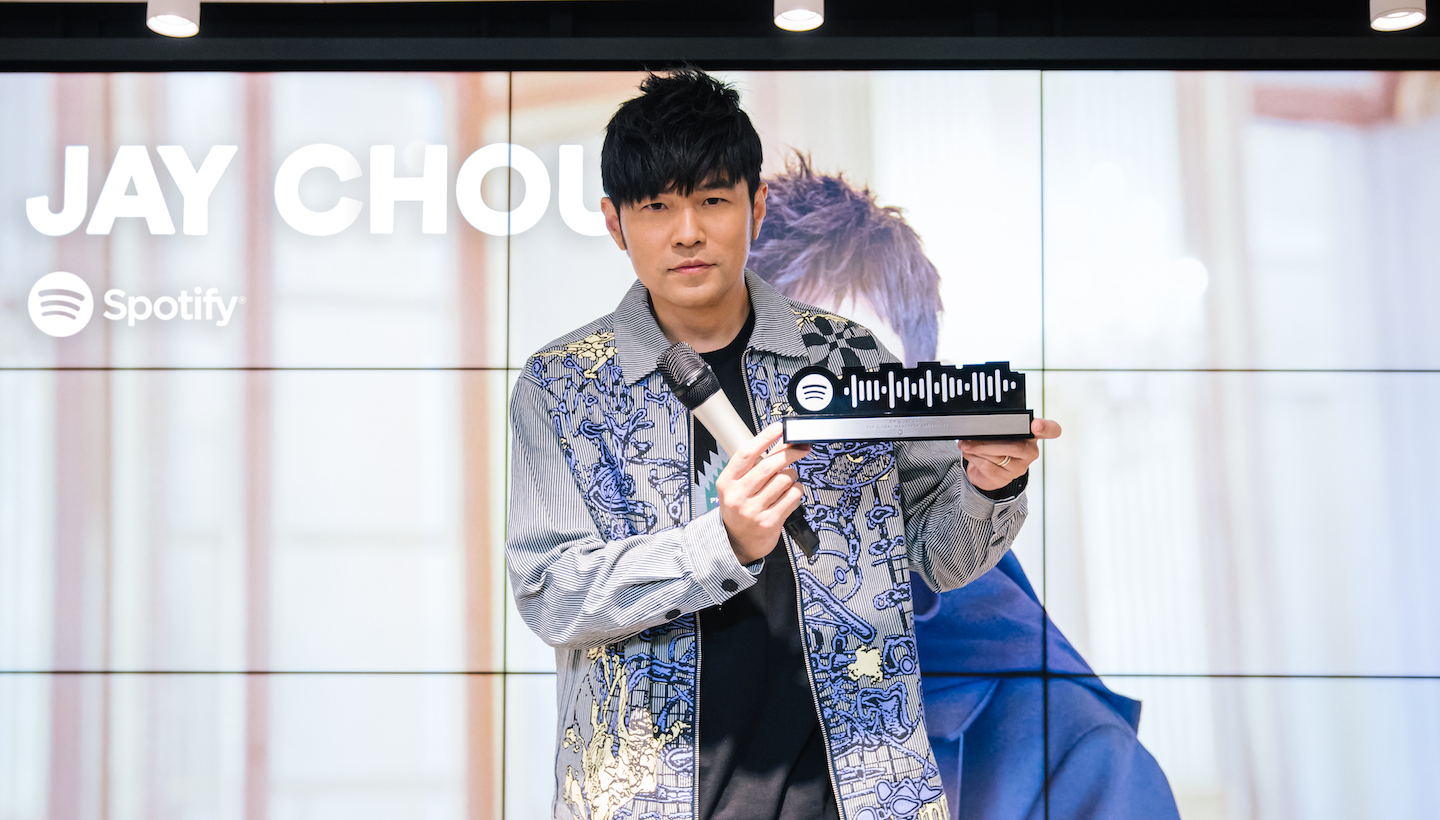 jay chou posing onstage in front of the camera