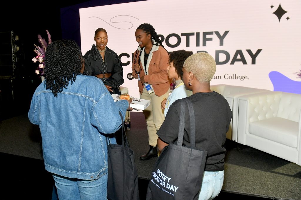 ATLANTA, GEORGIA - MARCH 20: Influencer, presenter and host, Wunmi Bello (L) and guests attend Spotify NextGen Creator Day at Spelman College on March 20, 2023 in Atlanta, Georgia. (Photo by Paras Griffin/Getty Images for Spotify)