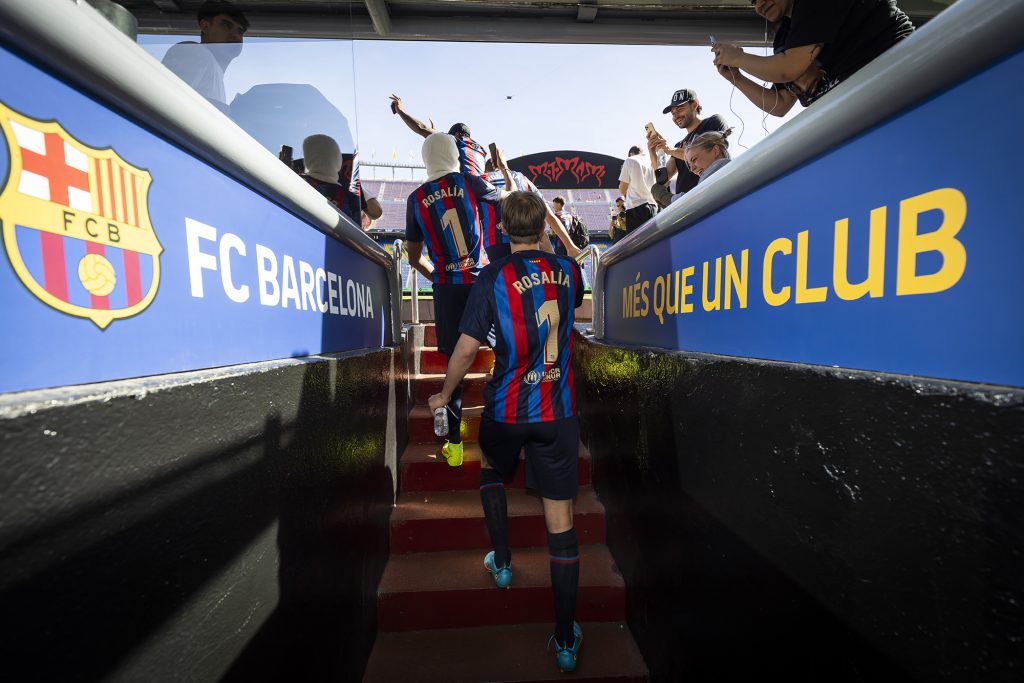 players walk from the locker rooms out into the field