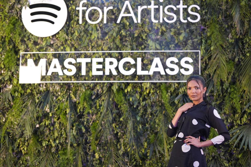 a greenery backdrop for the Spotify for Artists masterclass event