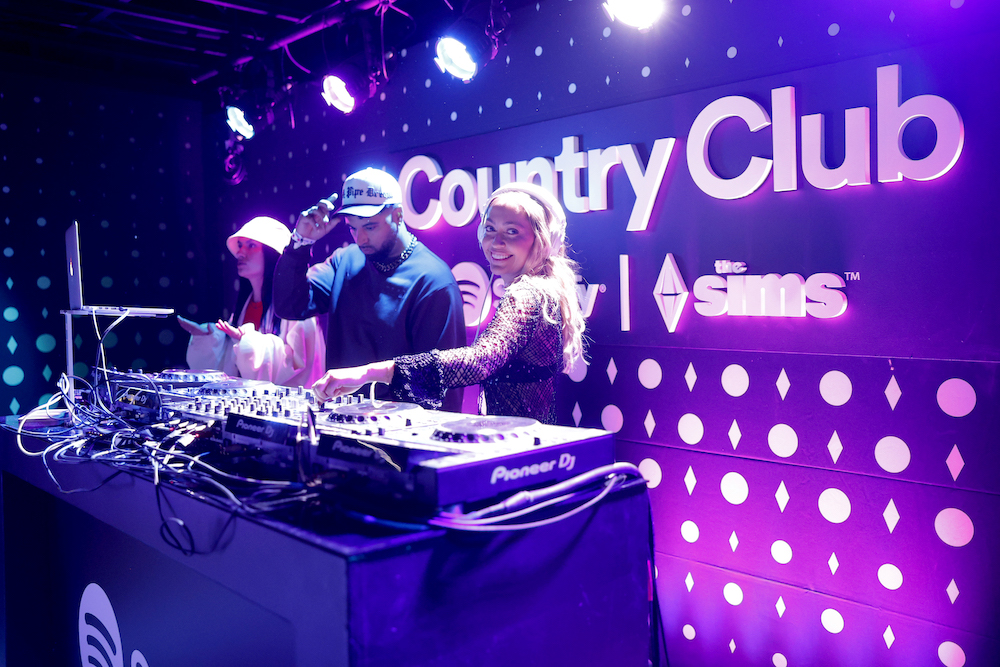 Brandi Cyrus spins at the Country Club at Spotify House during CMA Fest 2023