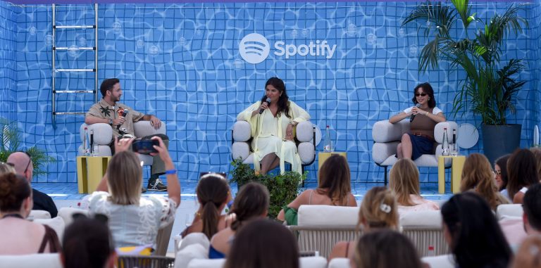 CANNES, FRANCE - JUNE 19: (L-R) Charlie Smith, CMO, Loewe, Taj Alavi, VP, Global Head of Marketing, Spotify and Emma Chamberlain, Creator of 'Anything Goes' onstage during the Spotify Beach At Cannes Lions 2023 Session: Building a Brand is More than Meets the Eye… And Ear on June 19, 2023 in Cannes, France. (Photo by Antony Jones/Getty Images for Spotify)