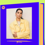 Lilly Singh staring at camera with her arms crossed