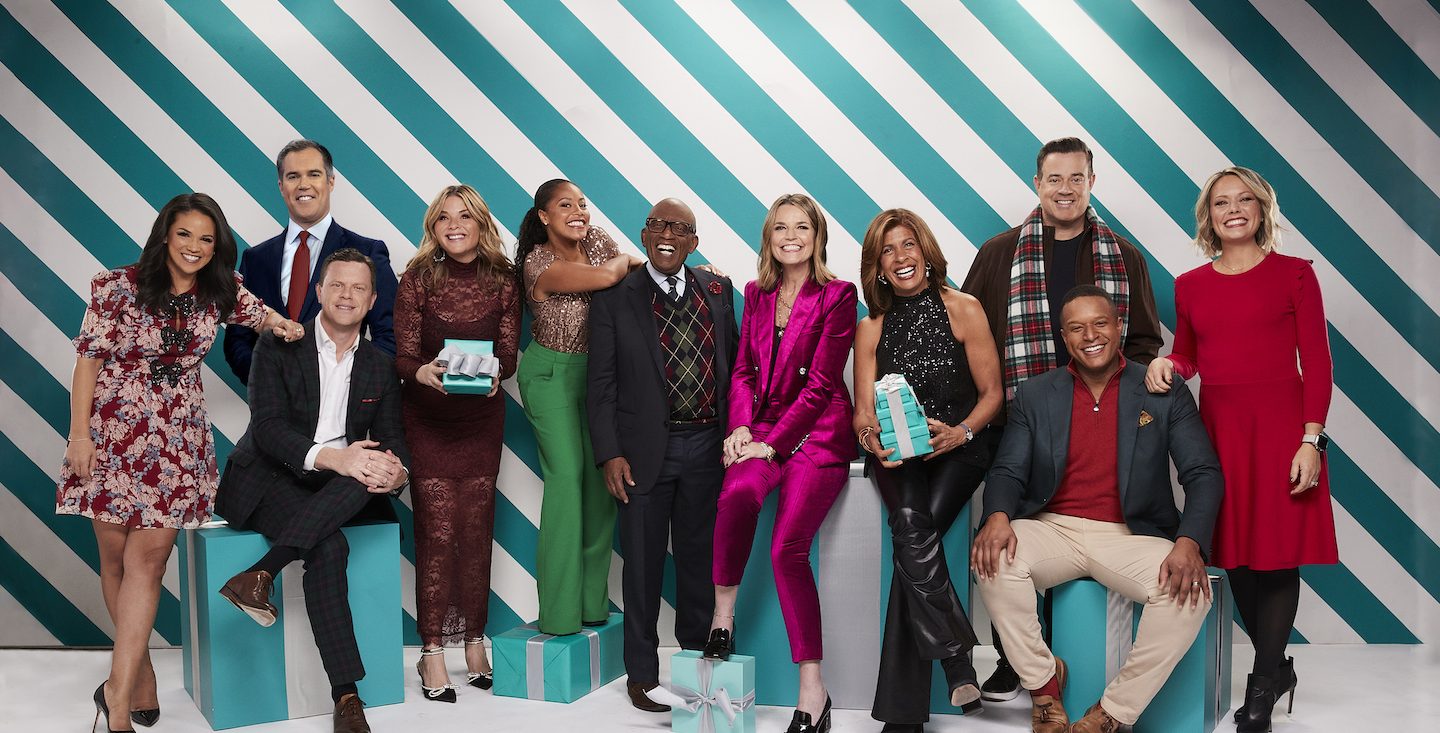 the TODAY show anchors standing in front of a green and white backdrop