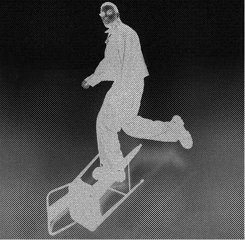 A black and white shot of a person walking