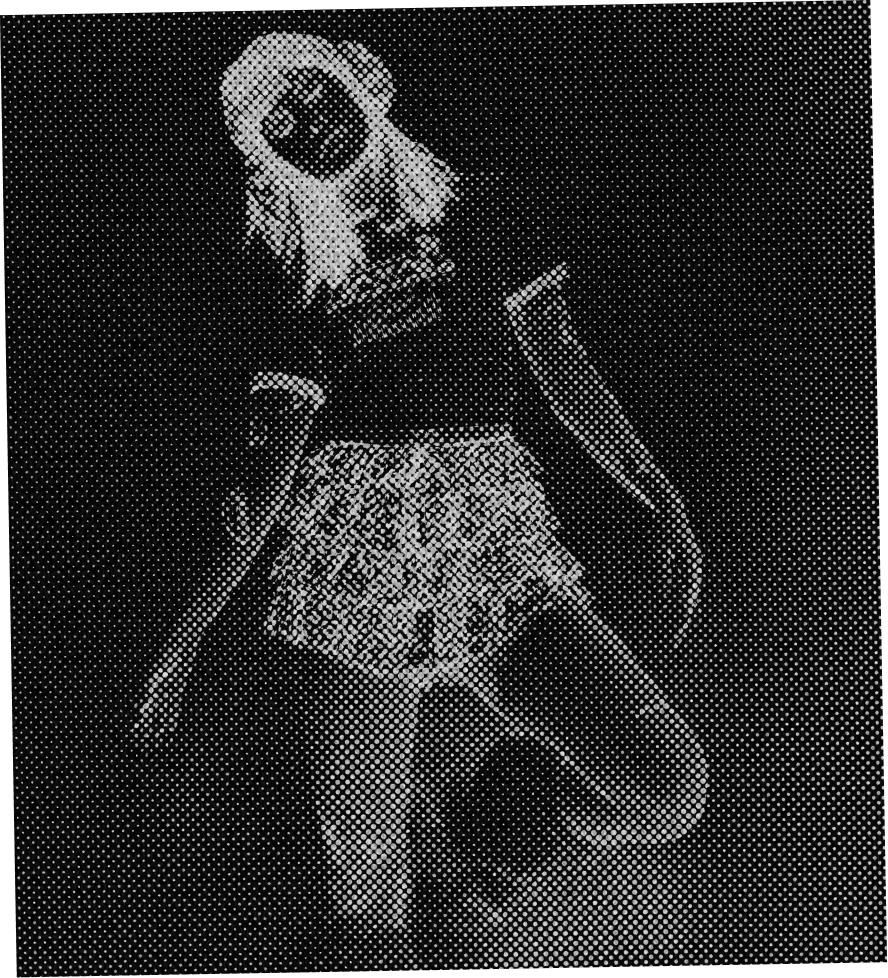 a black and white photo of a person looking at the camera