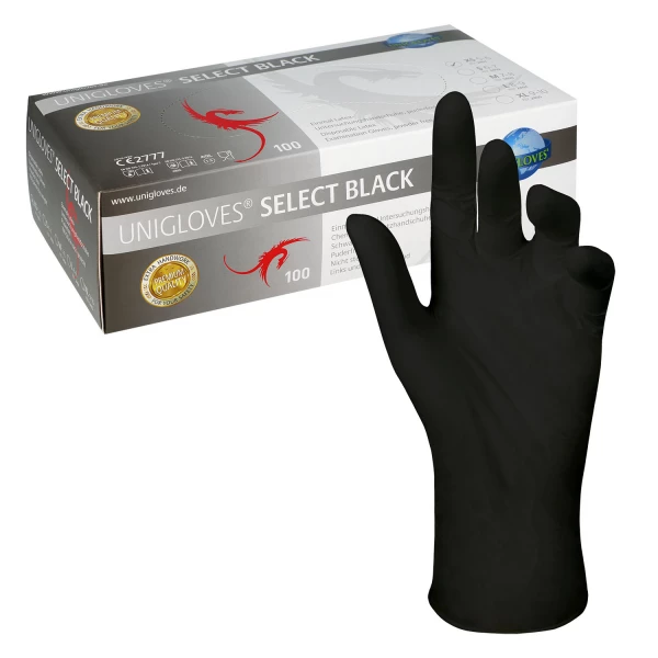 Schwarzer Latexhandschuh vor einer Spenderbox