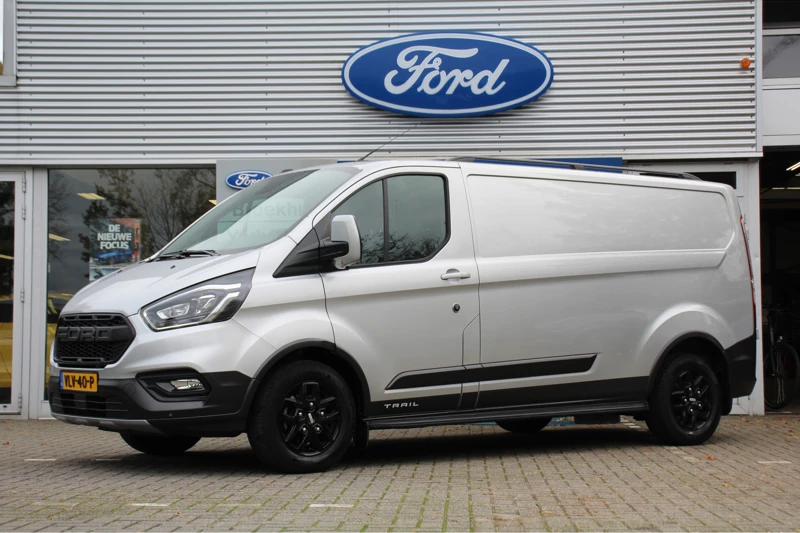 Ford Transit Custom 300 2.0 TDCI L2H1 TRAIL | 1E EIGENAAR! | DEALER OH! | LEDER | NAVI | CAMERA | STOELVERWARMING | VOORRUITVERWARMING | LED | LM. V