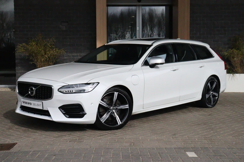 Volvo V90 T8 AWD Recharge R-Design | Crystal White | Schuifdak | 360° Camera | Trekhaak | Lederen dashboard | Harman Kardon | Adaptieve Cr