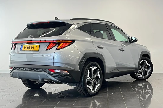 Hyundai Tucson 1.6 T-GDI MHEV 4WD | Premium | Stoelverwarming & -koeling | Getint glas | Draadloze telefoonlader | Keyless | DAB+ |