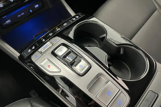 Hyundai Tucson 1.6 T-GDI MHEV 4WD | Premium | Stoelverwarming & -koeling | Getint glas | Draadloze telefoonlader | Keyless | DAB+ |