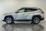 Hyundai Tucson 1.6 T-GDI MHEV 4WD | Premium | Stoelverwarming & -koeling | Getint glas | Draadloze telefoonlader | Keyless | DAB+ |