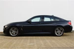 BMW 4 Serie Gran Coupé 418i M-Sport | Sportstoelen | PDC v+a | Climate Controle | Navigatie | 18'' LMV | Alcantara Bekleding | Stoelverwarmi