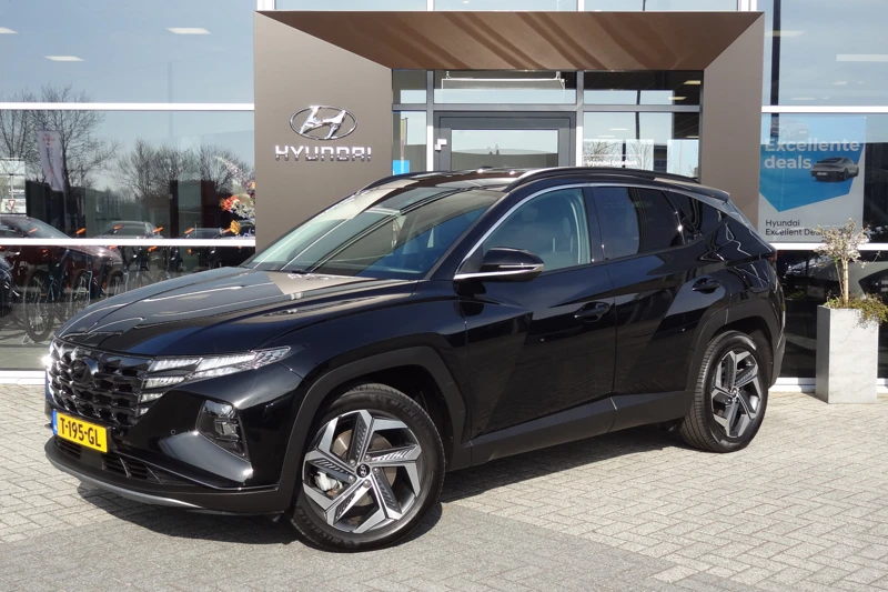 Hyundai Tucson 1.6 T-GDI PHEV Comfort Smart 4WD | PLUG-IN-HYBRID | NAVIGATIE | STOEL- & STUURVERWARMING | ACHTERUITRIJCAMERA