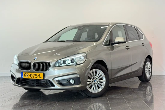 BMW 2 Serie Active Tourer 220i Luxury | Head-up display | Stoelverwarming | Navi | PDC voor + achter |