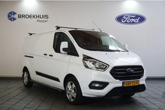 Ford Transit Custom 300 2.0TDCI L2H1 Trend | Navi | Groot scherm | Camera | Trekhaak | Dakdragers | LMV | Sidebars | Voorruitverwarming | Cruise Con