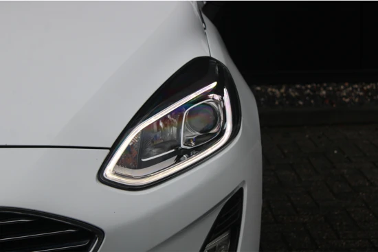 Ford Fiesta 1.0 100pk Titanium | NL-AUTO | B&O AUDIO | CAMERA | VOORUITVERWARMING | SPOILER | NAVIGATIE