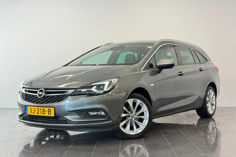 Opel Astra Sports Tourer 1.4 Innovation | Camera | AGR stoelen | Navigatie | Climate | Dodehoekdetectie | Getint glas | PDC voor+achter|