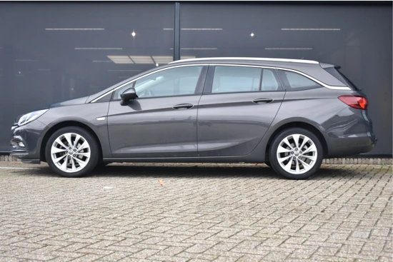 Opel Astra Sports Tourer 1.4 Turbo Edition+ 150pk | Trekhaak | Navigatie | Parkeersensoren | 17"LMV | Climate Control | Mistlampen | Regens