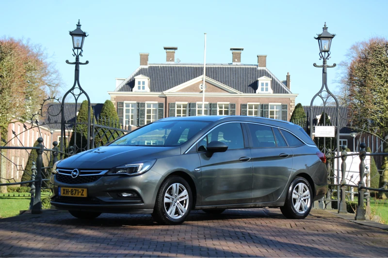 Opel Astra Sports Tourer 1.4T ONLINE EDITION | NL-AUTO! | STOEL + STUURVERWARMING | TREKHAAK 1400KG | NAVI | CLIMA | CRUISE | AGR-COMFORT |