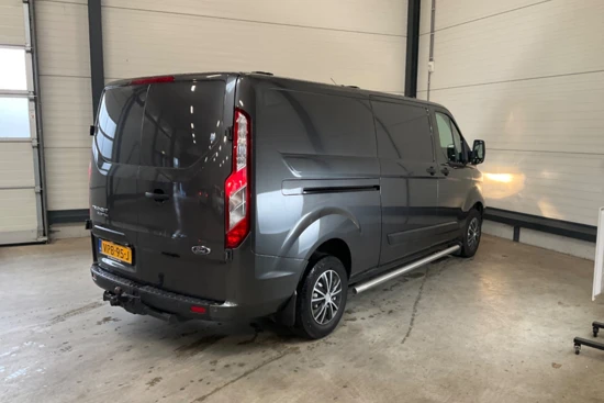 Ford Transit Custom 300 2.0 TDCI L2H1 Trend | DAKDRAGERS WEGKLAPBAAR | CAMERA | TREKHAAK | SIDEBARS | VOORRUIT VERWARMING | 100% DEALER ONDERHOUDEN