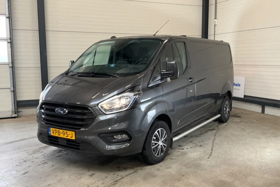 Ford Transit Custom 300 2.0 TDCI L2H1 Trend | DAKDRAGERS WEGKLAPBAAR | CAMERA | TREKHAAK | SIDEBARS | VOORRUIT VERWARMING | 100% DEALER ONDERHOUDEN