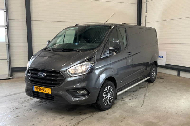 Ford Transit Custom 300 2.0 TDCI L2H1 Trend | DAKDRAGERS WEGKLAPBAAR | CAMERA | TREKHAAK | SIDEBARS | VOORRUIT VERWARMING | 100% DEALER ONDERHOUDEN