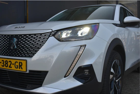 Peugeot e-2008 EV Allure €2000 SUBSIDIE | 3D-Navigatie | Stoelverwarming | Achteruitrijcamera | Full-LED | Parkeersensoren | Half-Leder | Cruis