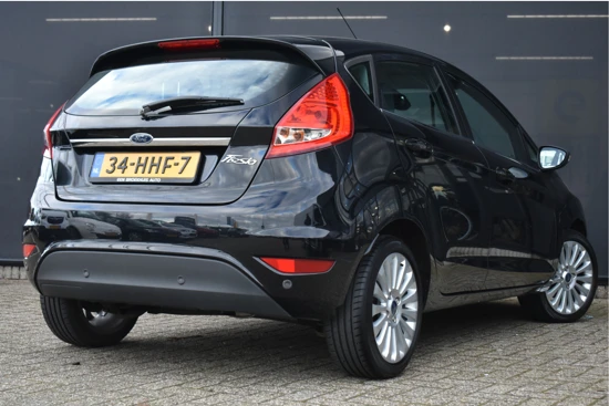 Ford Fiesta 1.25 Titanium | Cruise Control | Voorruitverwarming | Parkeersensoren | Bluetooth | Regensensor | Climate Control | 15"LMV | Air